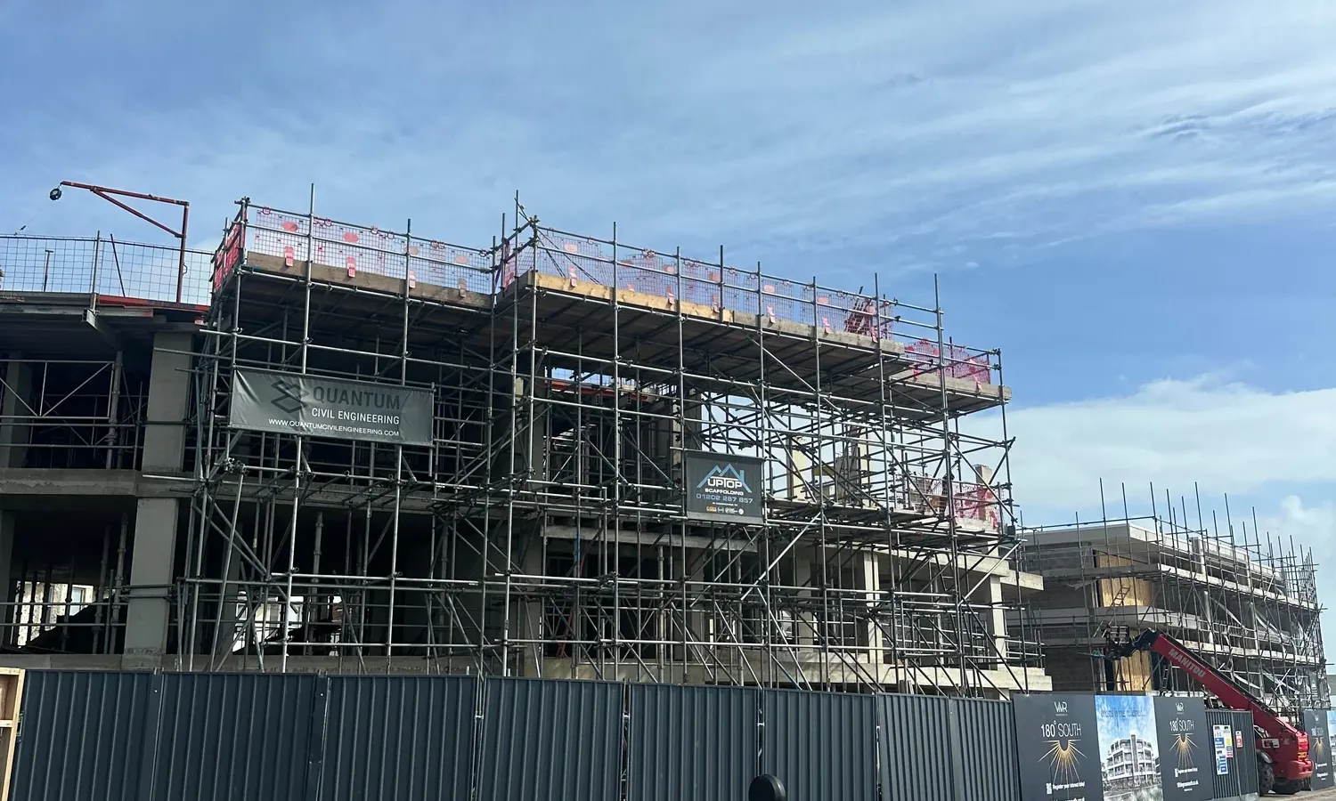Scaffold loading bay at Block B of the 180 Degrees development in Southbourne, viewed from across the road