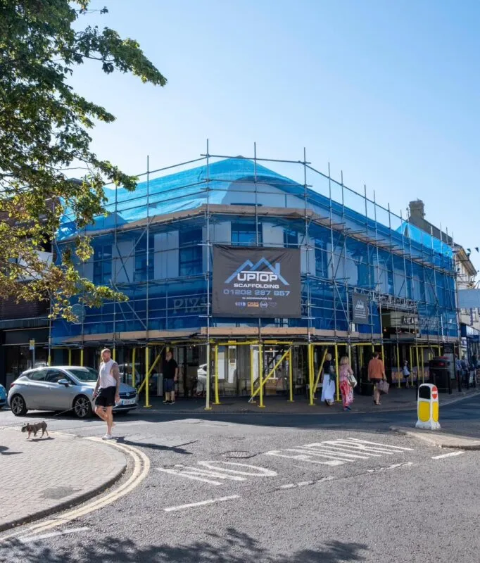 Street scaffold erected for soffit repairs in Christchurch Dorset with maintained pedestrian access