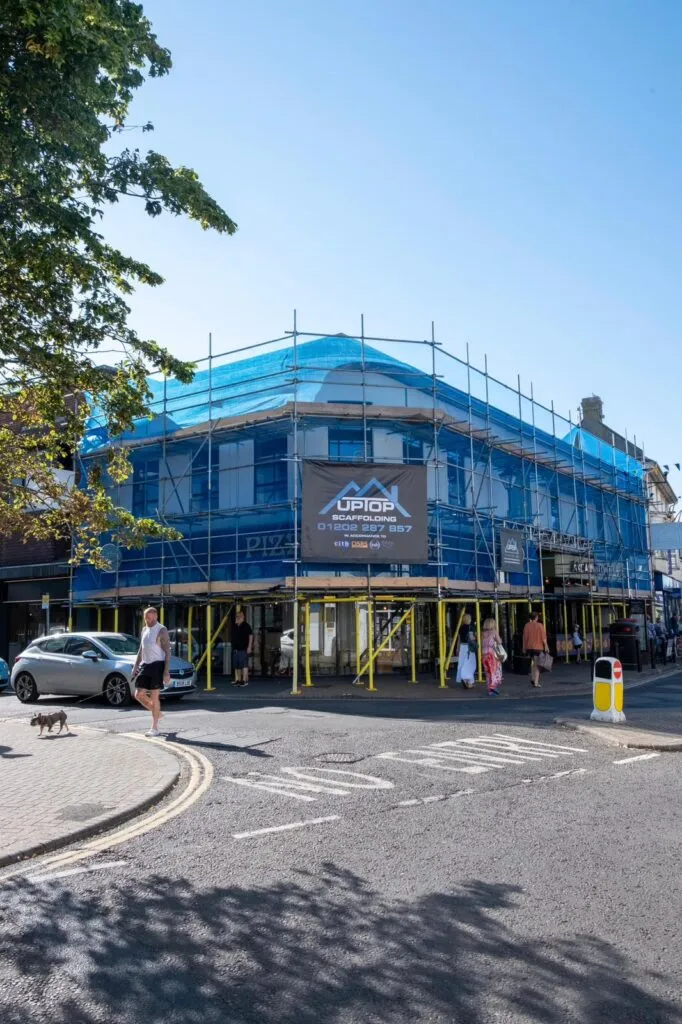 Street scaffold erected for soffit repairs in Christchurch Dorset with maintained pedestrian access