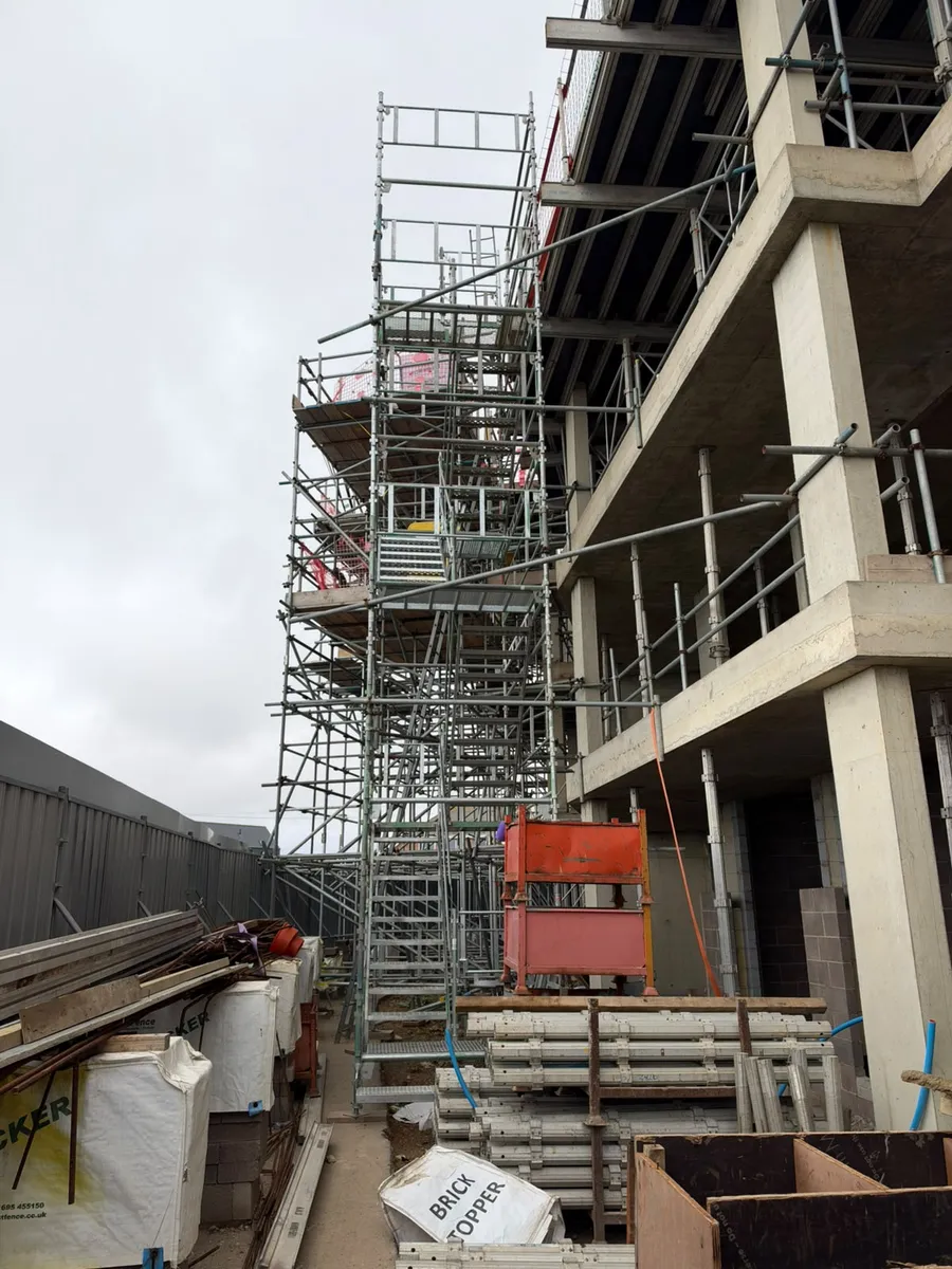 Side view looking up the HAKI staircase flights and landings beside the building