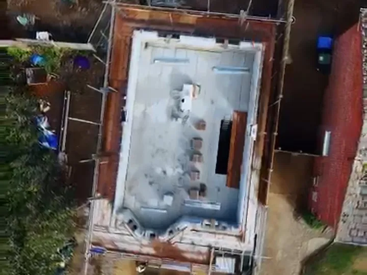 Aerial view of scaffolding around a new build in Parkstone, Poole, Dorset