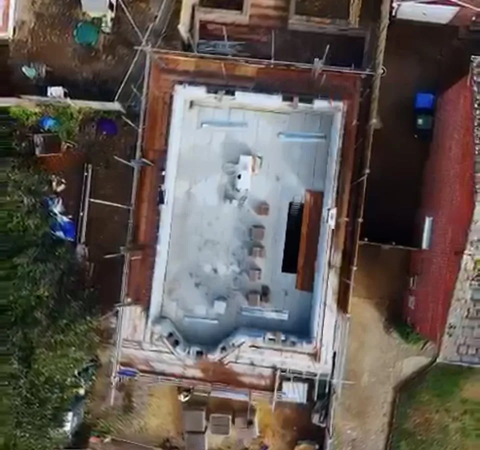 Aerial view of scaffolding around a new build in Parkstone, Poole, Dorset