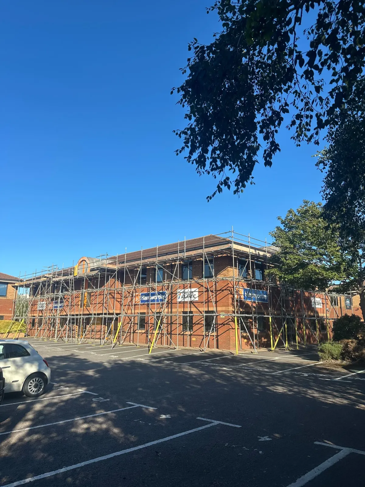 Front view of scaffolding around the commercial building at New Fields Business Park, Poole