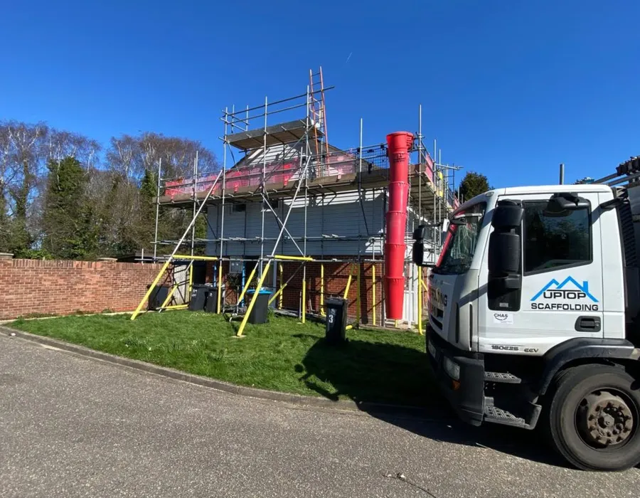 Up Top Scaffolding lorry on site at residential roof replacement project in Christchurch Dorset. Full scaffold installation and roofing works carried out in-house for Sovereign Network Group. Scaffolding Christchurch, scaffolding company Bournemouth, roof
