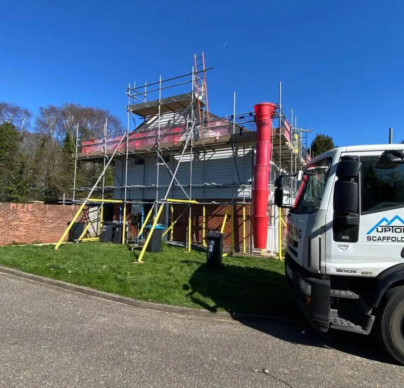 Up Top Scaffolding lorry on site at residential roof replacement project in Christchurch Dorset. Full scaffold installation and roofing works carried out in-house for Sovereign Network Group. Scaffolding Christchurch, scaffolding company Bournemouth, roof